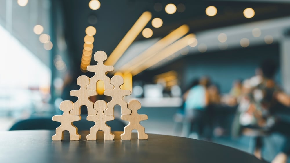 Person,Model,Standing,On,Another,Man,Who,Was,An,Employee